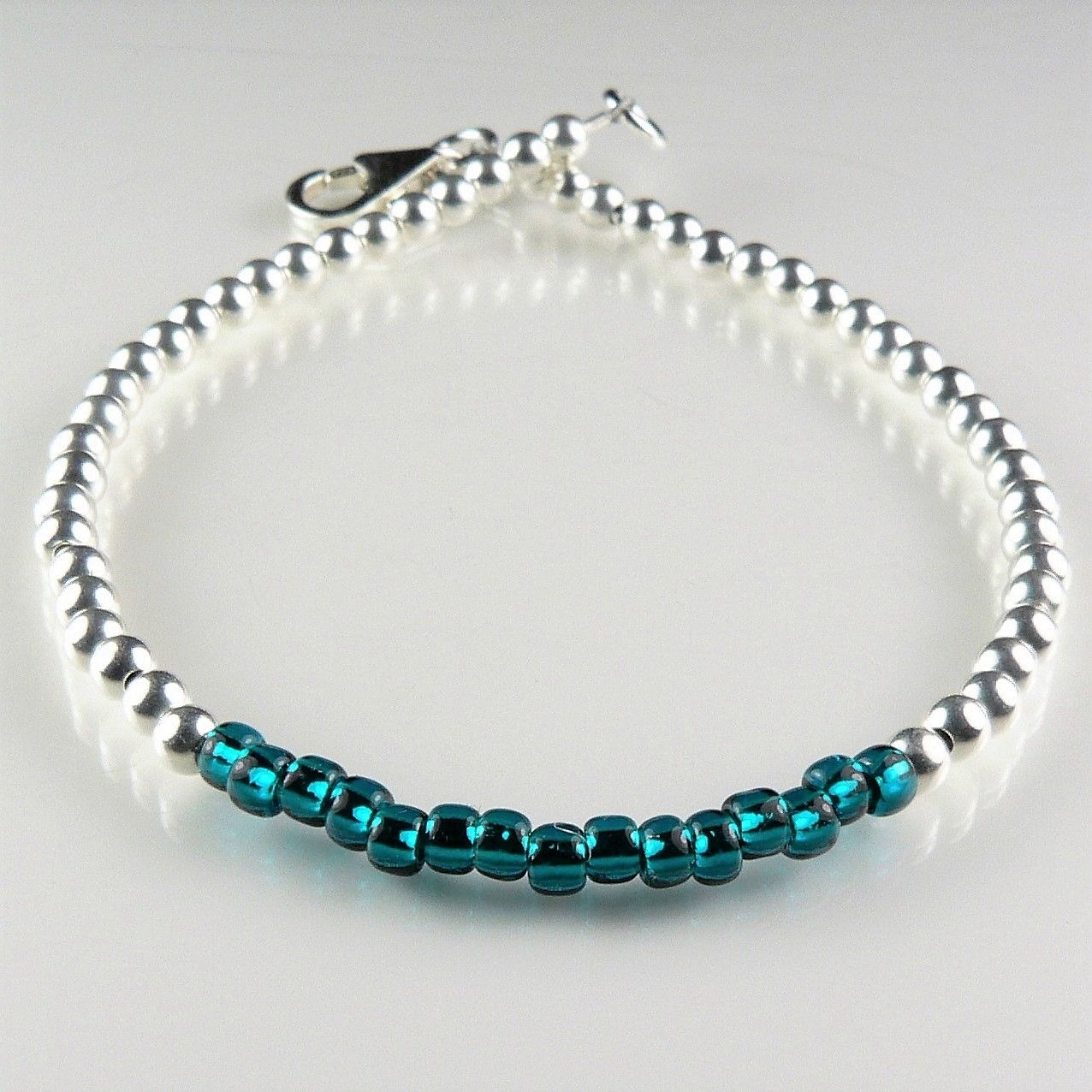 Handmade sterling silver and Toho glass seed bead bracelet with lobster clasp