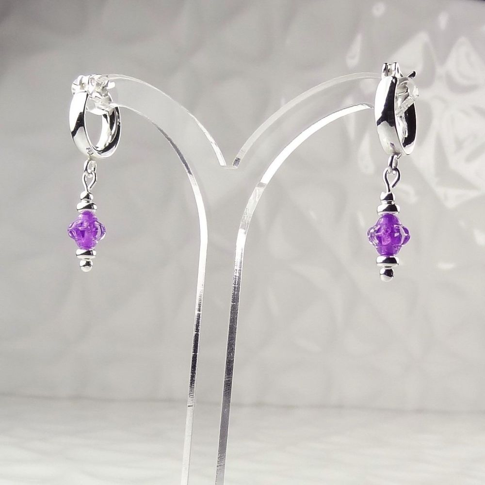 6mm purple Czech glass flowers hanging from sterling silver 12mm huggie-hoop earrings, in a gift box