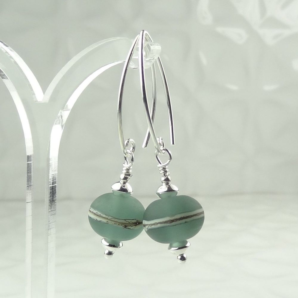 Satin finish green with silvered ivory stringer handcrafted artisan lampwork glass sterling silver drop earrings on 'V' wires ~ length 44mm