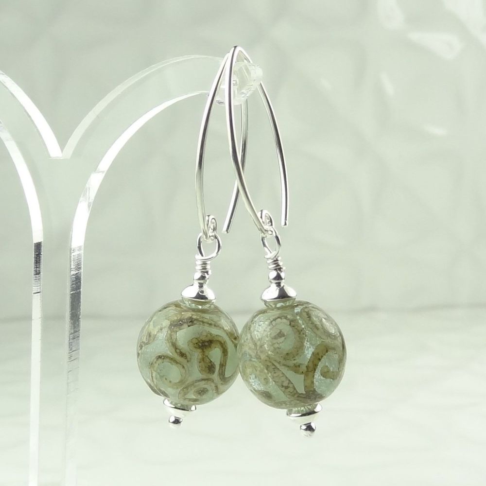 Pale green with silvered ivory scrolls handcrafted artisan lampwork glass & sterling silver earrings on 'V' wires ~ UK made ~ length 47mm