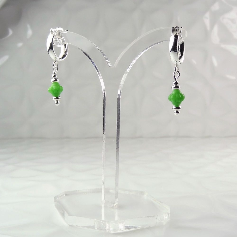 6mm green Czech glass flowers hanging from sterling silver 12mm huggie-hoop earrings, in a gift box