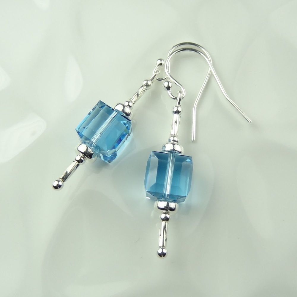 Sterling silver earrings made with 8mm Aquamarine blue faceted cube Swarovski Elements in a gift box