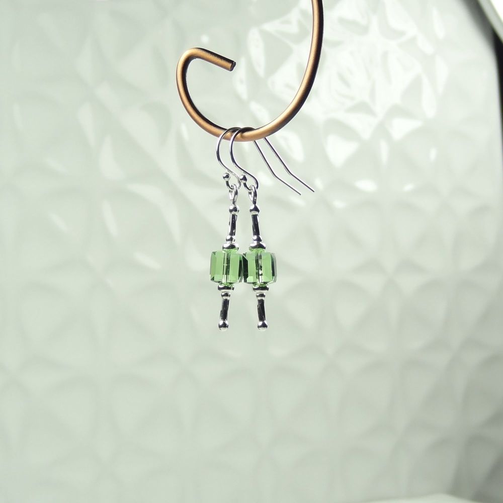 Sterling silver earrings made with 6mm Peridot green faceted cube Swarovski Elements in a gift box (#282)