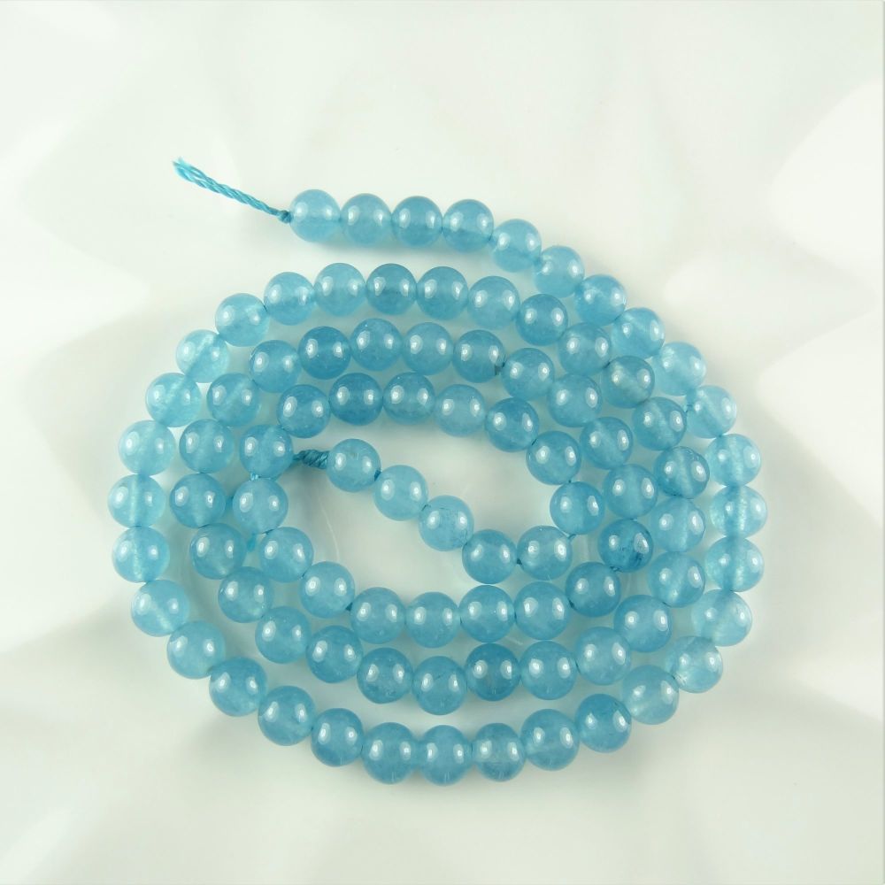 4mm (+/-) blue Sponge Quartz (dyed) semi-precious stone & sterling silver fluted, hammered & faceted bead bracelet with lobster clasp, in a gift box