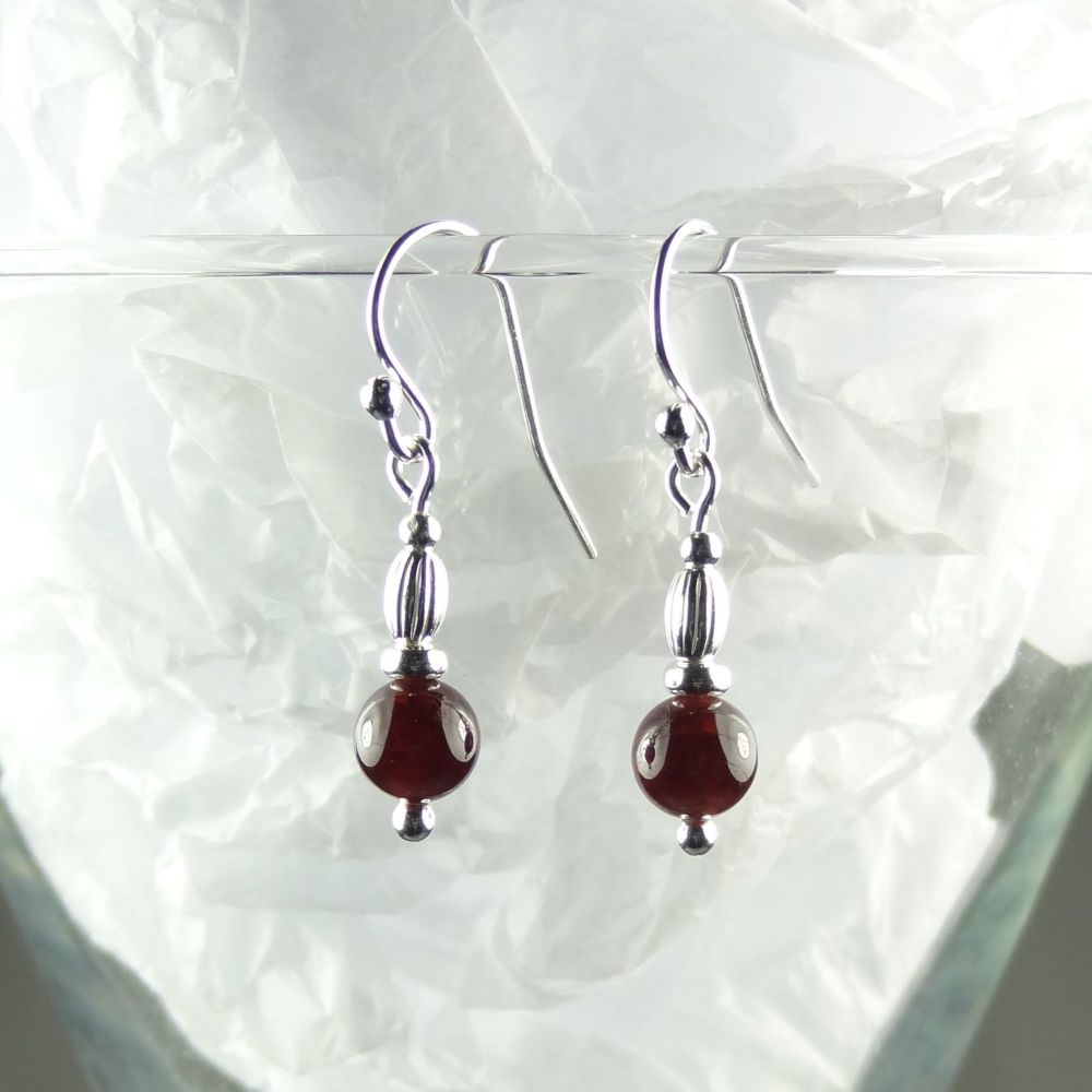 Sterling silver and 6mm (+/-) dark red Garnet semi-precious stone drop/dangle earrings - January birthday birthstone (S)