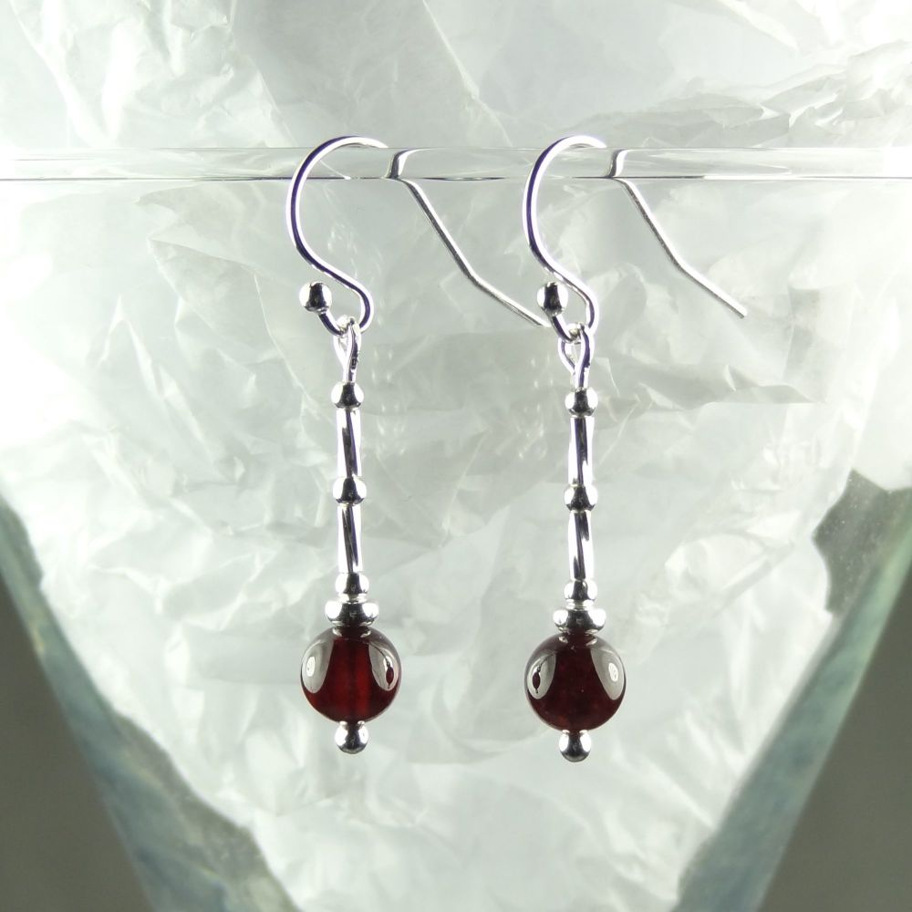 Sterling silver and 6mm (+/-) dark red Garnet semi-precious stone drop/dangle earrings - January birthday birthstone (L)