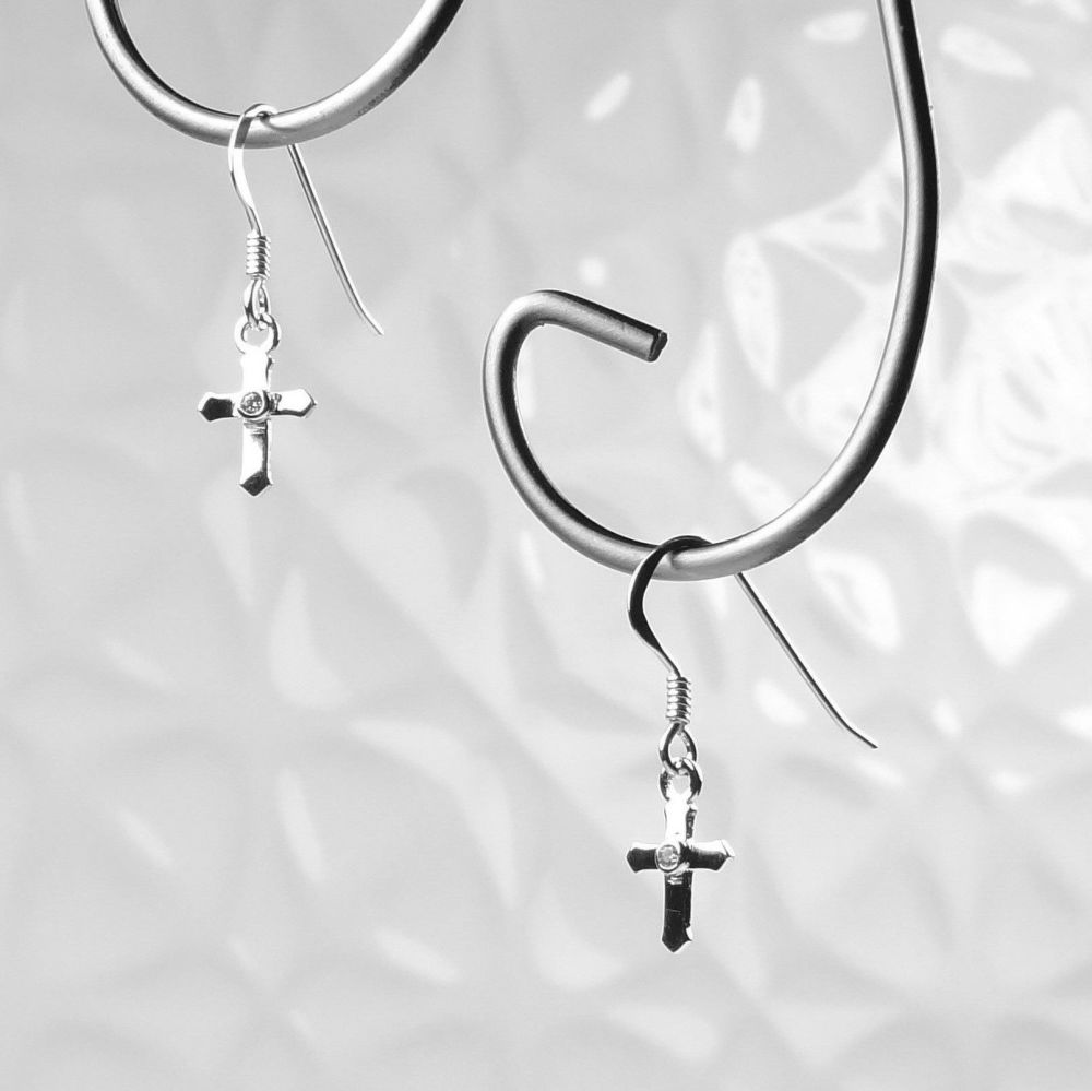 Dainty/small 7mm sterling silver cross earrings with a colourless Cubic Zirconia stone in the middle, in a gift box