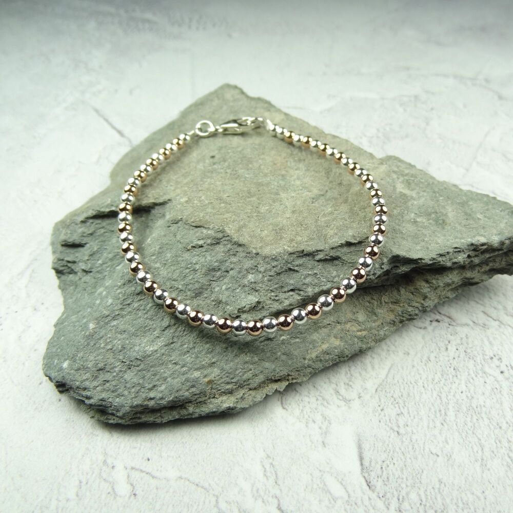 Sterling silver & 14K rose-gold filled bead stacking bracelet with lobster clasp (#3 ~ round)