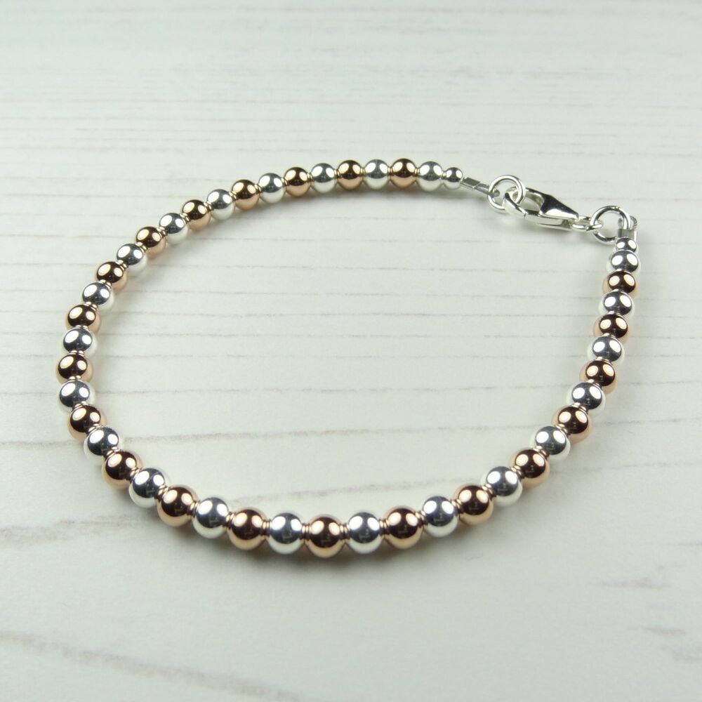 Sterling silver & 14K rose-gold filled bead stacking bracelet with lobster clasp (#4 ~ round)