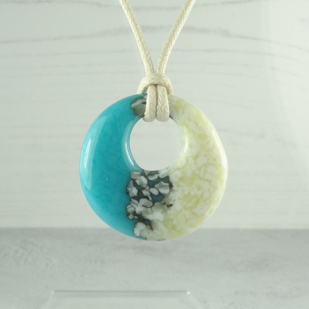 Handcrafted turquoise blue & french vanilla fused glass off-set round pendant on a waxed cotton cord with lobster clasp (#38)