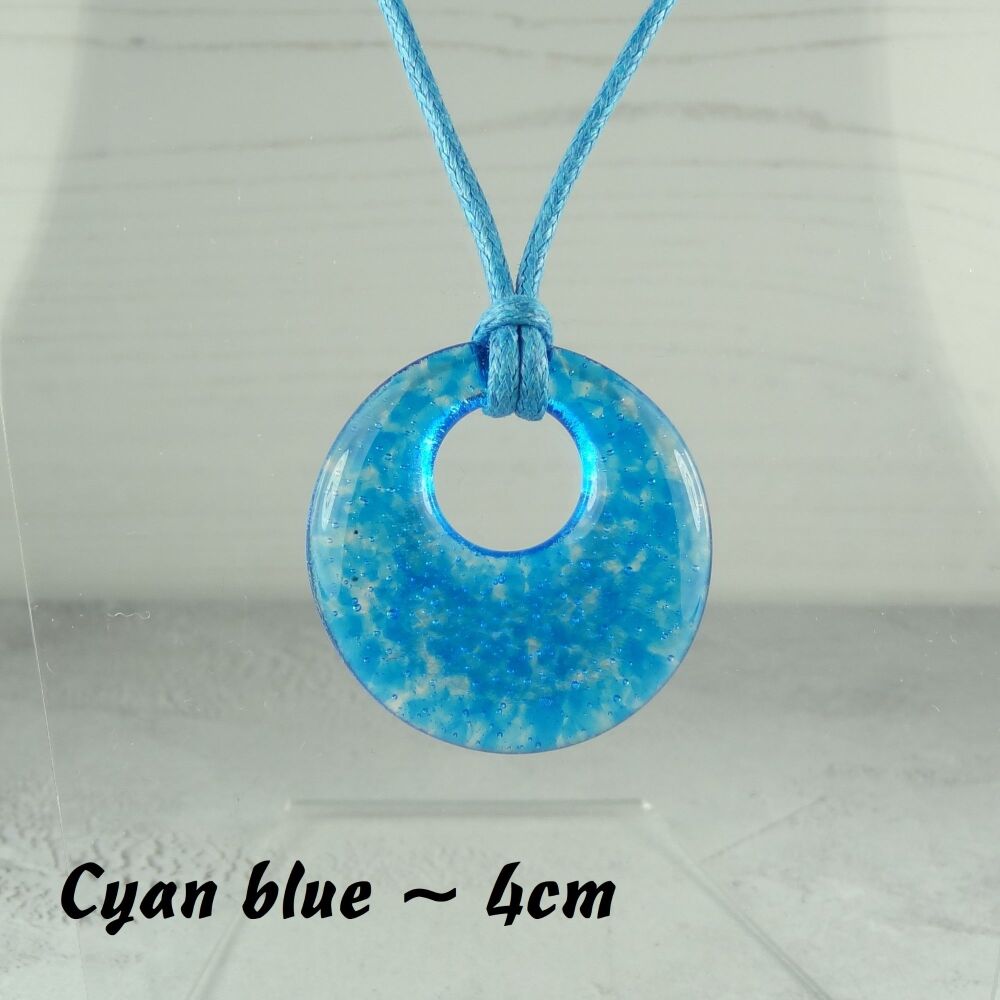 Handcrafted cyan blue fused glass off-set round pendant on a waxed cotton cord with lobster clasp (#27)