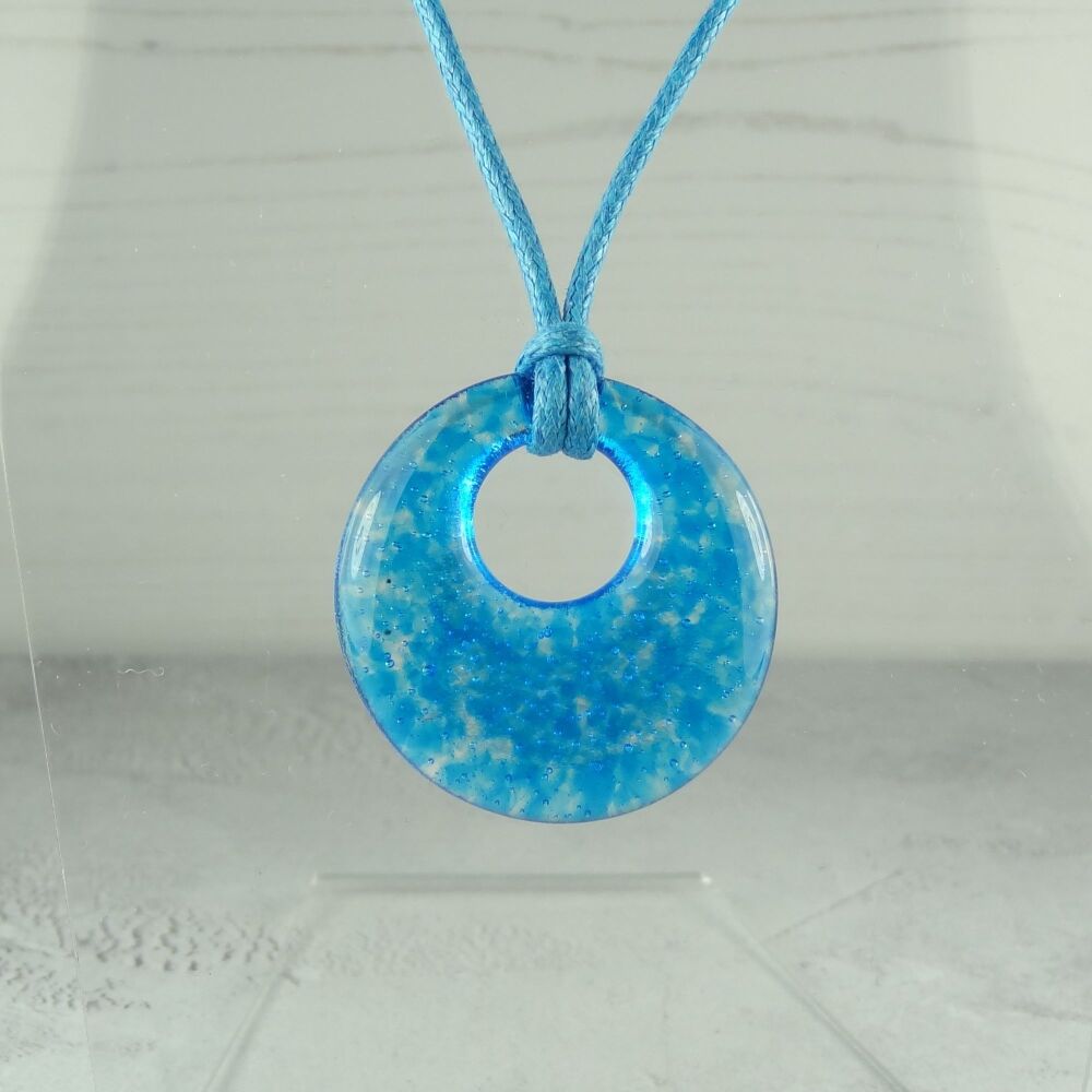 Handcrafted cyan blue fused glass off-set round pendant on a waxed cotton cord with lobster clasp (#27)