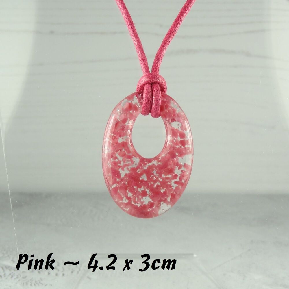 Handcrafted pink fused glass off-set oval pendant on a waxed cotton cord with lobster clasp (#18)