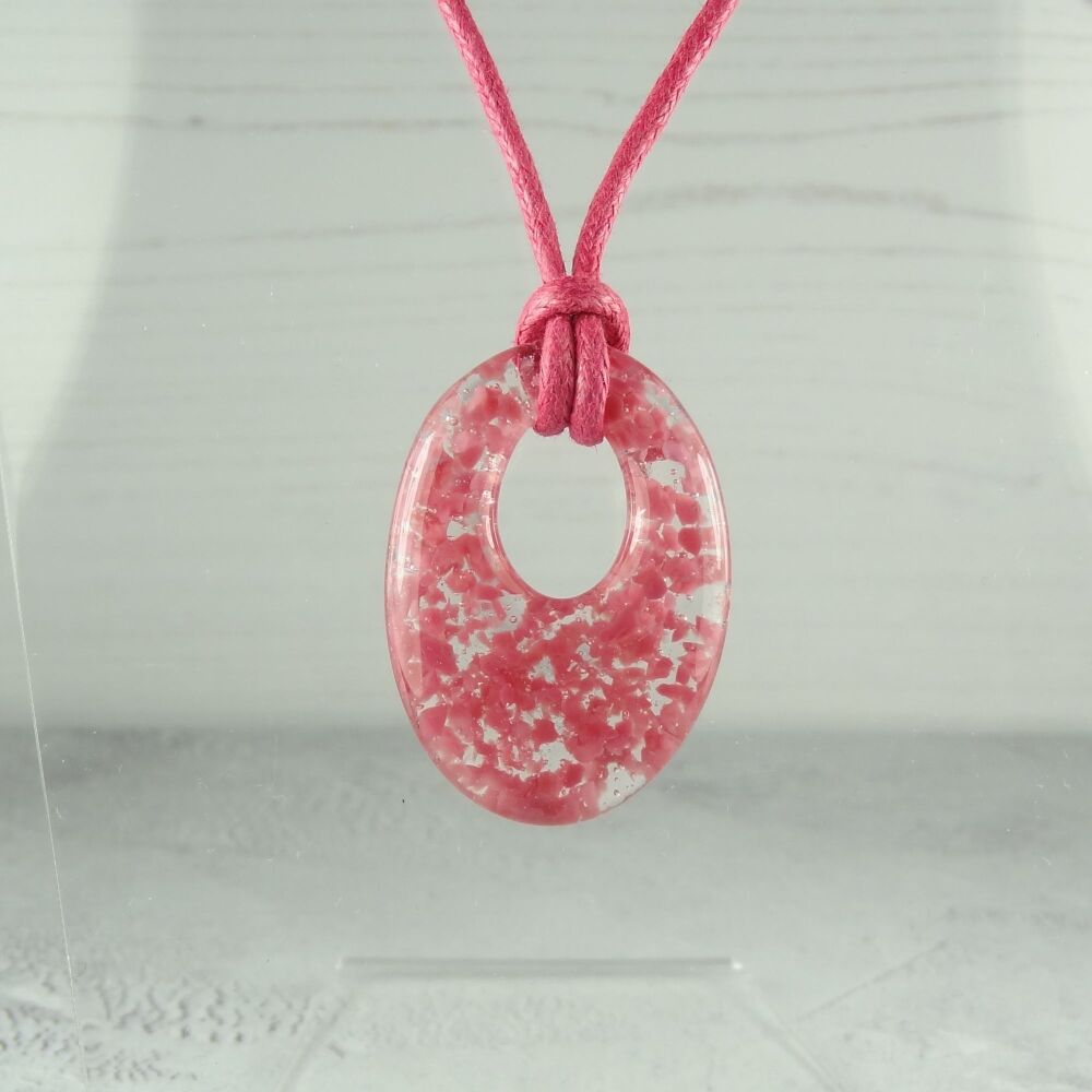 Handcrafted pink fused glass off-set oval pendant on a waxed cotton cord with lobster clasp (#18)