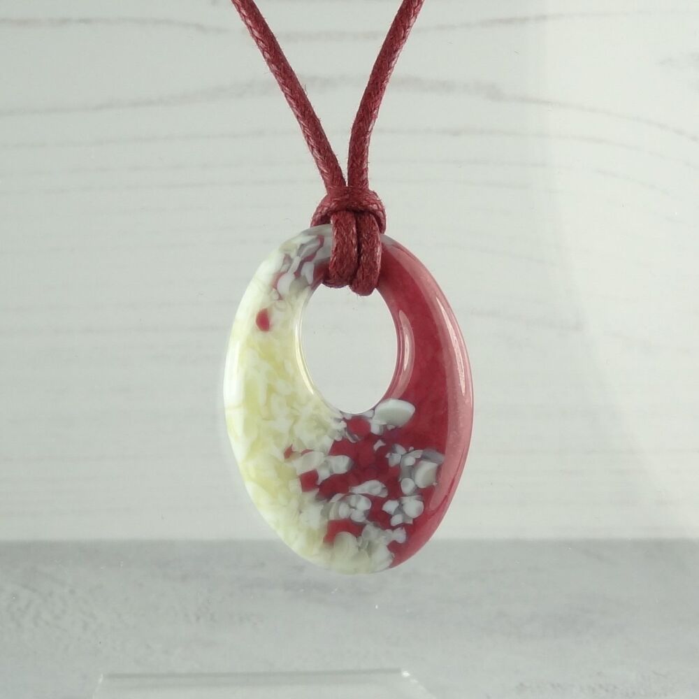 Handcrafted pink & french vanilla fused glass off-set oval pendant on a waxed cotton cord with lobster clasp (#35)