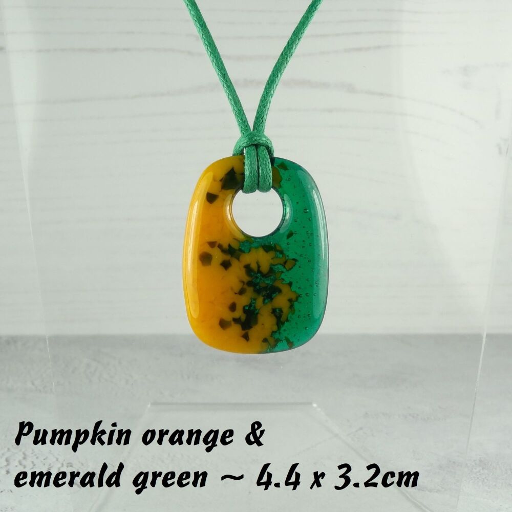 Handcrafted emerald green & pumpkin orange fused glass rectangular pendant on a waxed cotton cord with lobster clasp (#40)