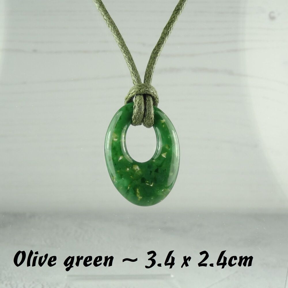 Handcrafted olive green fused glass off-set oval pendant on a waxed cotton cord with lobster clasp (#14)