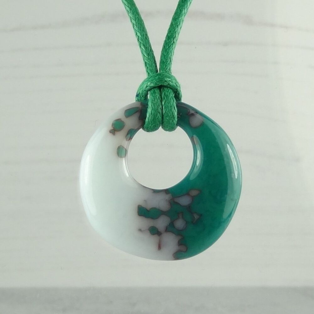 Handcrafted teal green & reactive cloud fused glass off-set round pendant