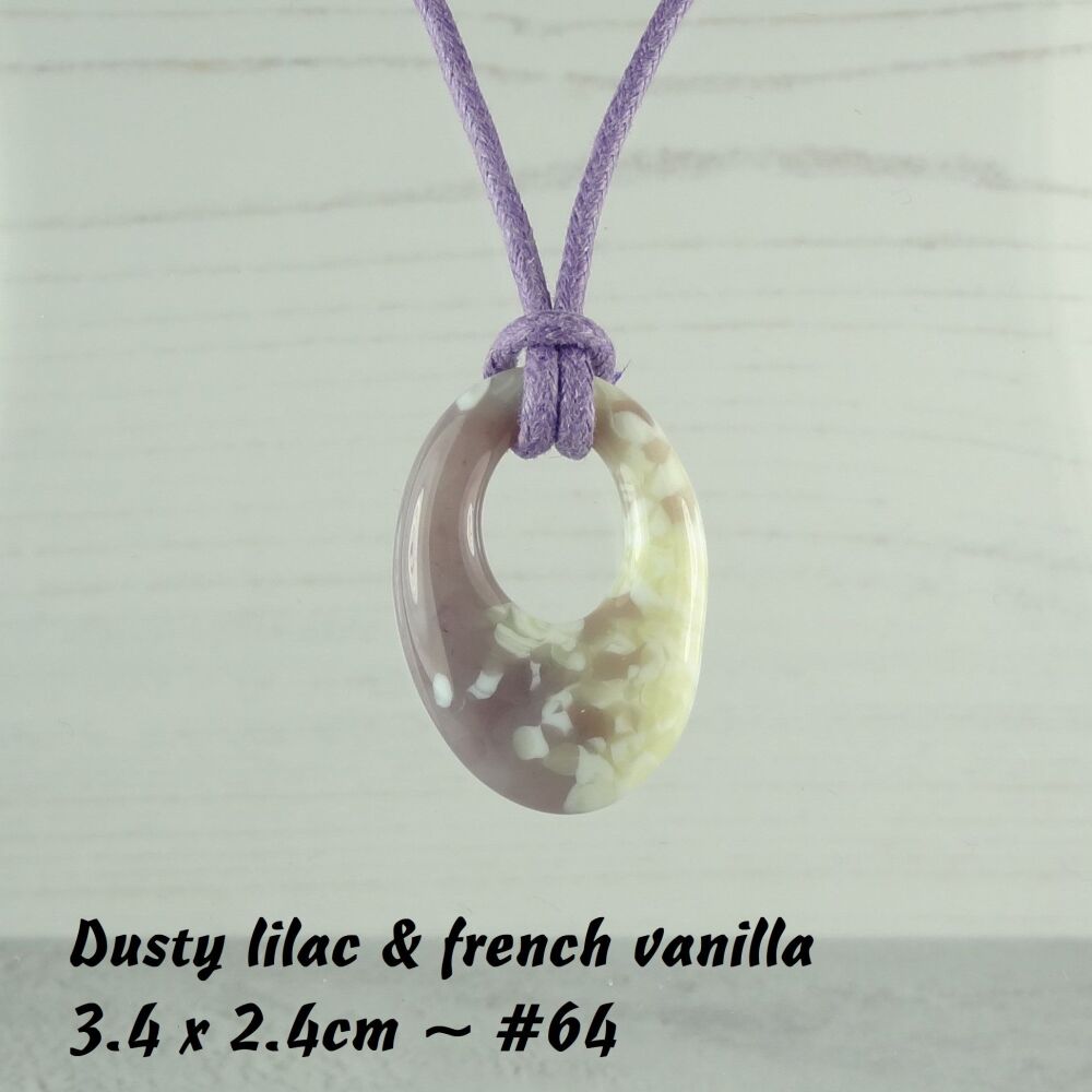 Handcrafted dusty lilac & french vanilla fused glass off-set oval pendant on a waxed cotton cord with lobster clasp (#64)