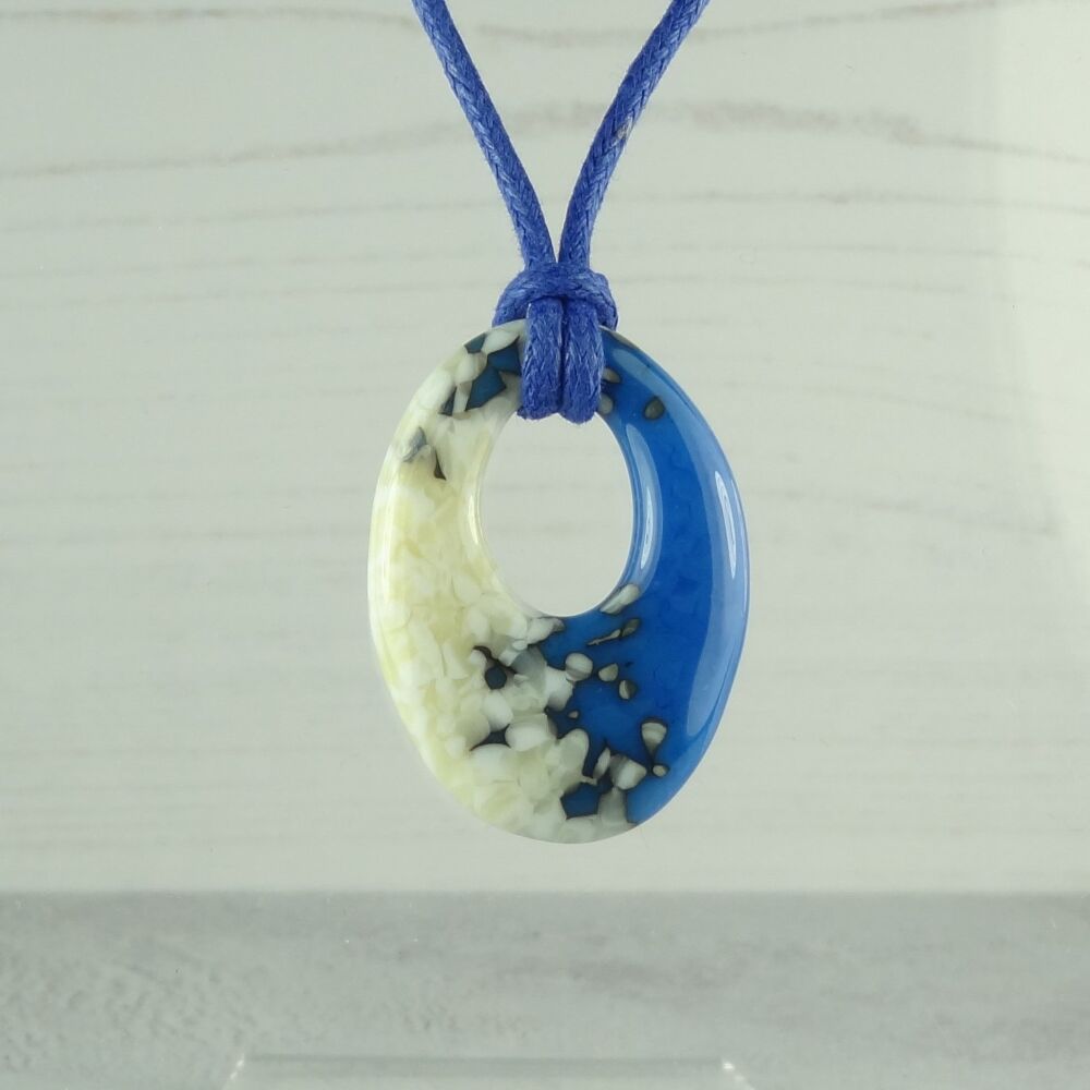 Handcrafted egyptian blue & french vanilla fused glass off-set oval pendant on a waxed cotton cord with lobster clasp (#68)