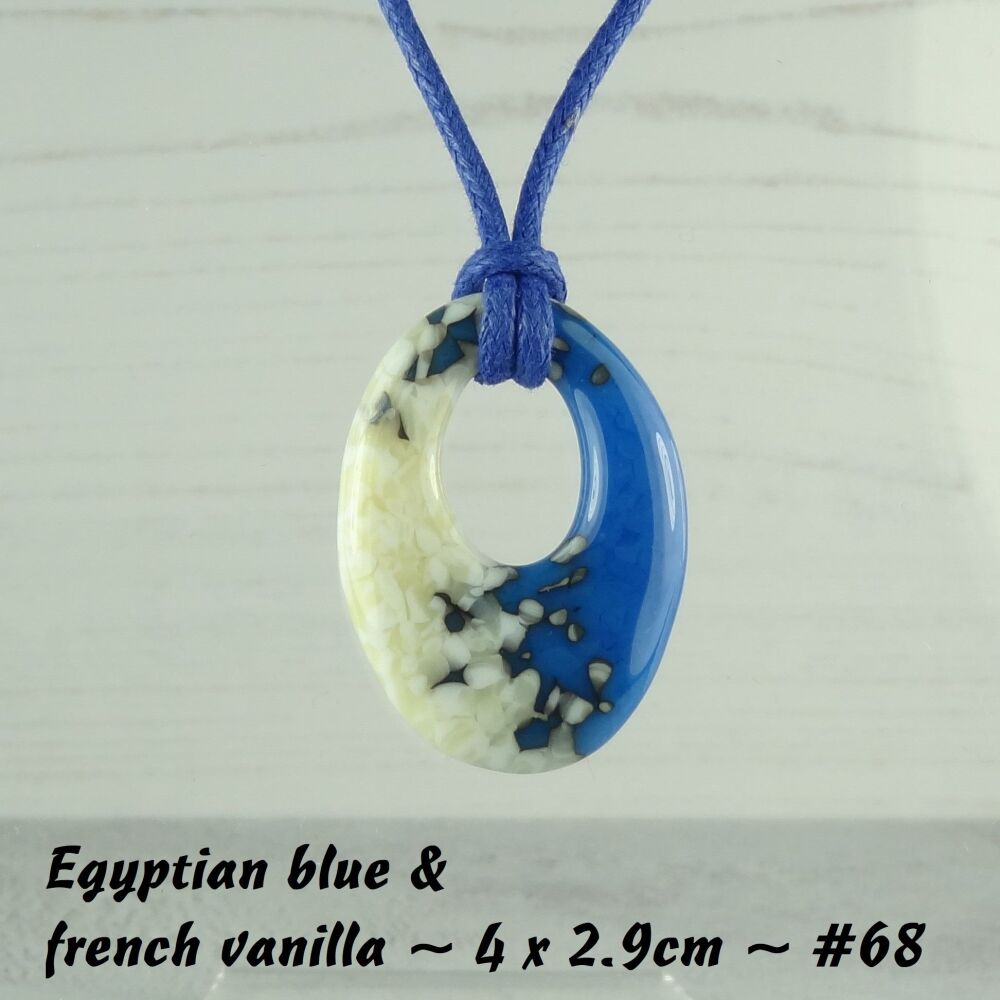 Handcrafted egyptian blue & french vanilla fused glass off-set oval pendant on a waxed cotton cord with lobster clasp (#68)