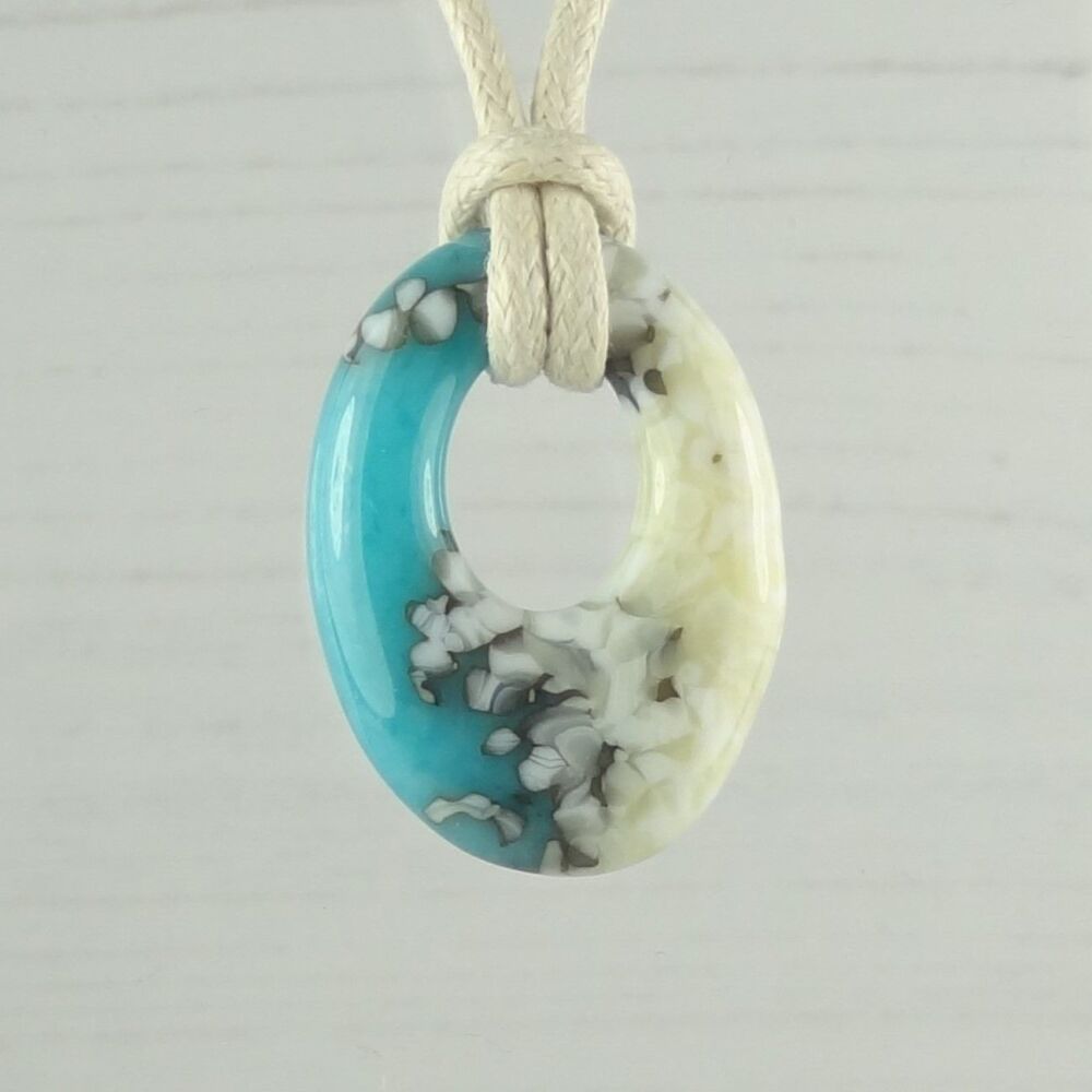 Handcrafted turquoise blue & french vanilla fused glass off-set oval pendant on a waxed cotton cord with lobster clasp (#66)