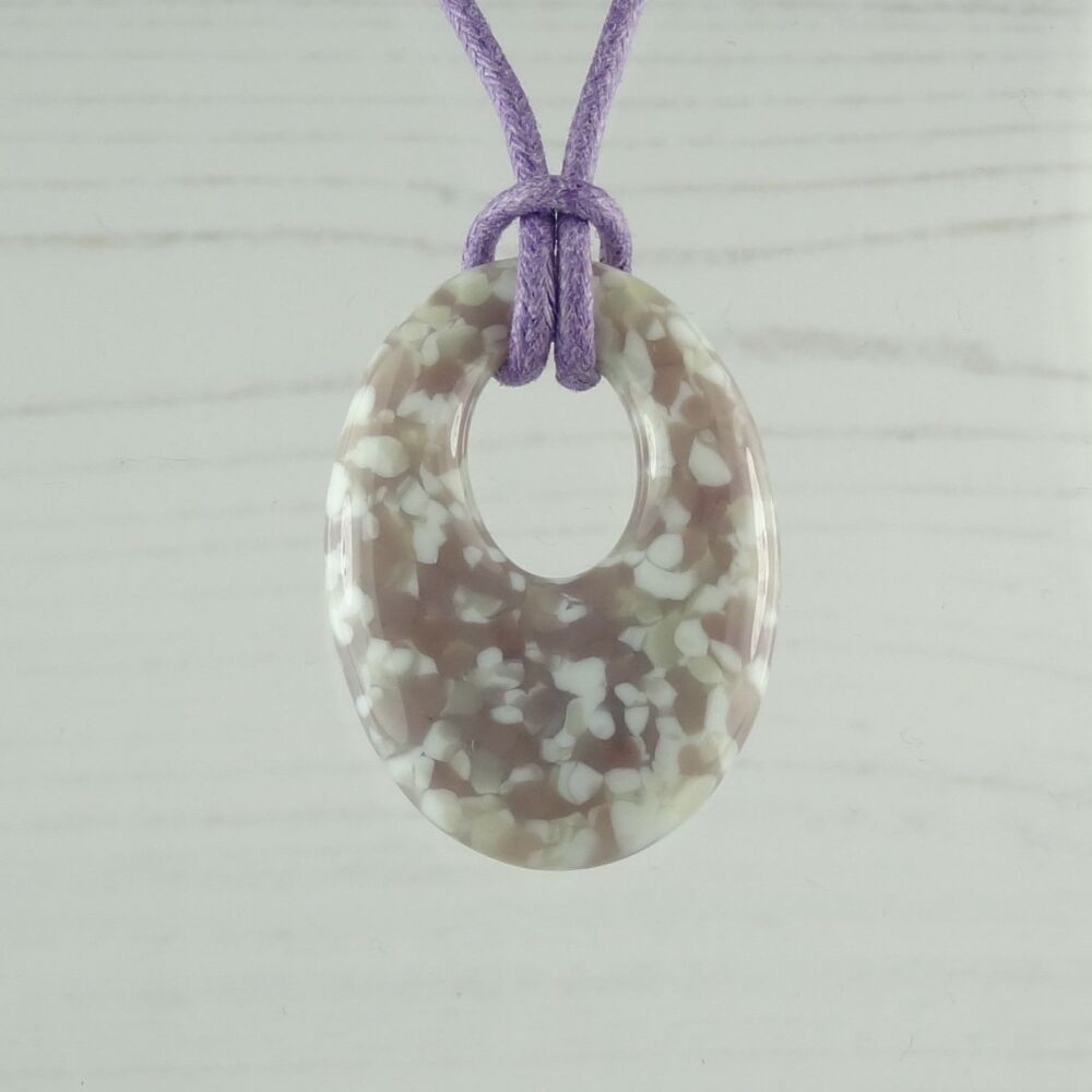 Handcrafted dusty lilac & french vanilla fused glass off-set oval pendant on a waxed cotton cord with lobster clasp (#125)