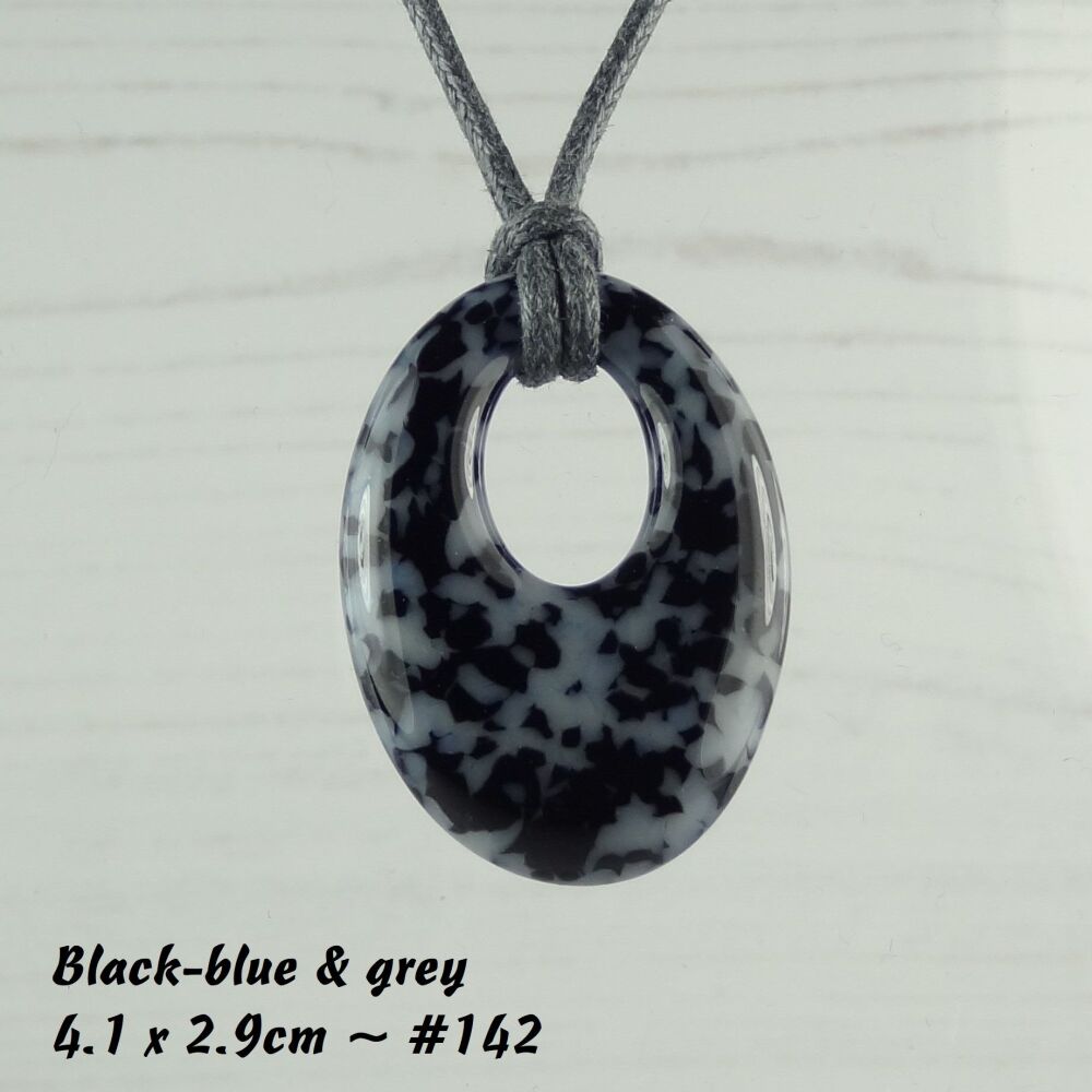 Handcrafted grey & black-blue fused glass off-set oval pendant on a waxed cotton cord with lobster clasp (#142)