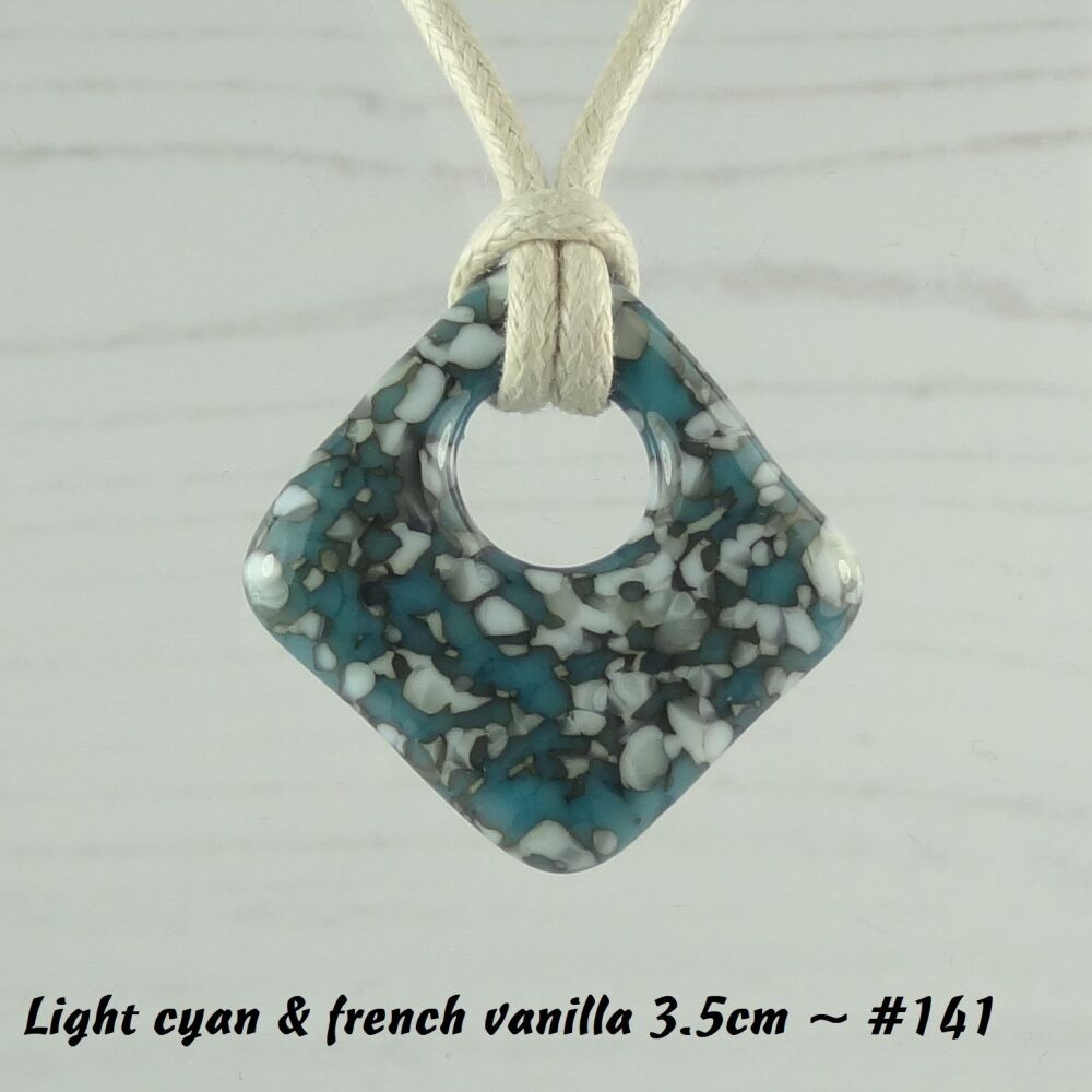 Handcrafted light cyan blue & french vanilla fused glass rhombus/diamond shaped pendant on a waxed cotton cord with lobster clasp (#141)