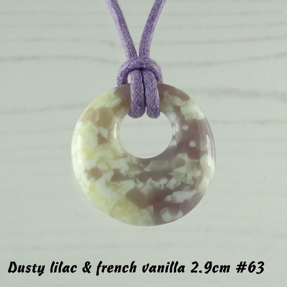 Handcrafted dusty lilac purple & french vanilla fused glass off-set round pendant on a waxed cotton cord with lobster clasp (#63)