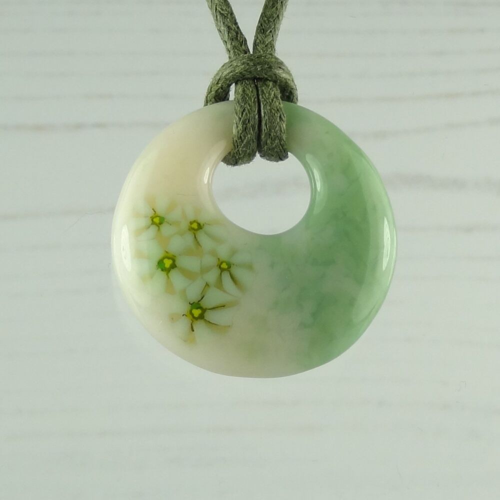 Handcrafted celadon green & light peach cream with murrini slices fused glass off-set round pendant on a waxed cotton cord with lobster clasp (#112)