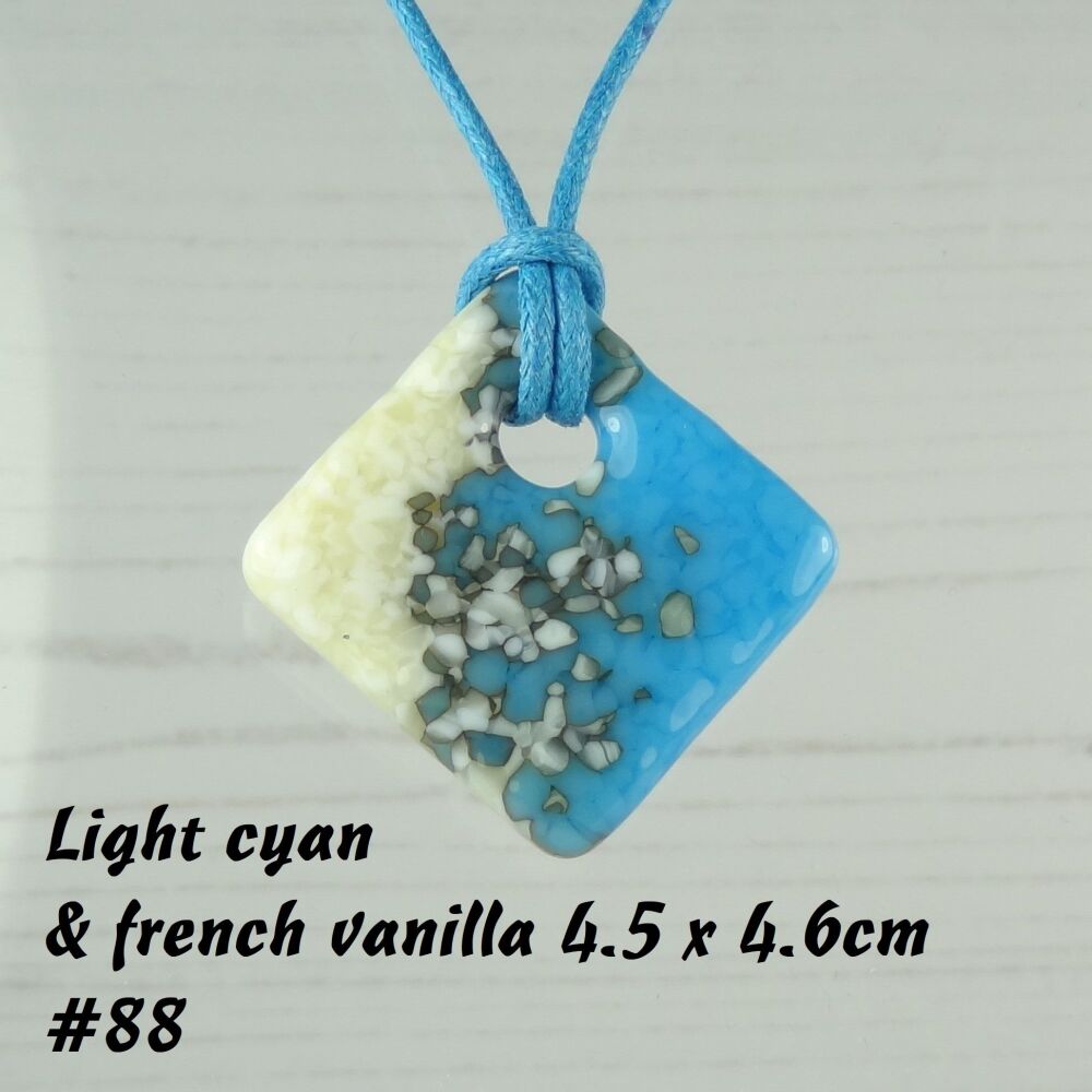 Handcrafted light cyan blue & french vanilla fused glass rhombus/diamond shaped pendant on a waxed cotton cord with lobster clasp (#88)