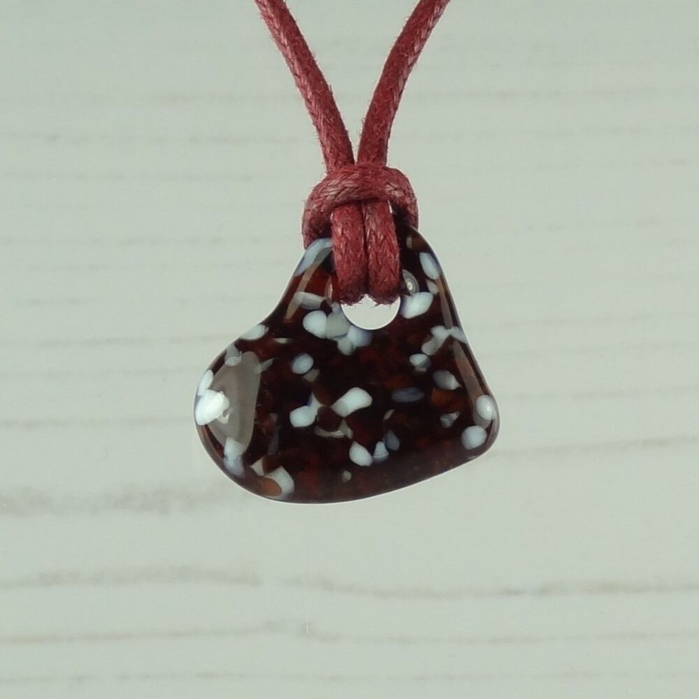 Handcrafted fused glass off-set heart shaped pendant on a waxed cotton cord