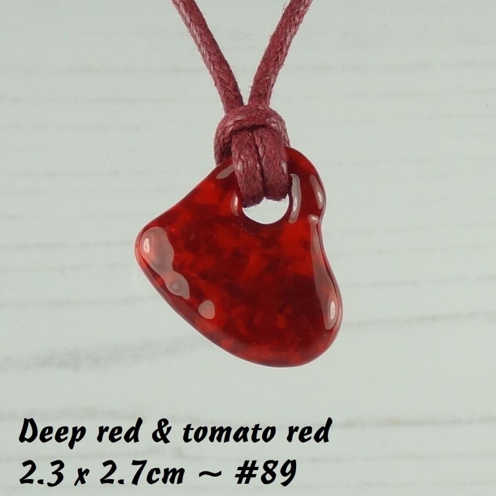 Handcrafted fused glass red off-set heart shaped pendant on a waxed cotton cord with lobster clasp (#89)