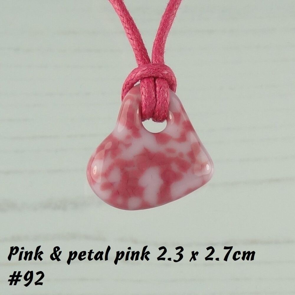 Handcrafted fused glass pink off-set heart shaped pendant on a waxed cotton cord with lobster clasp (#92)