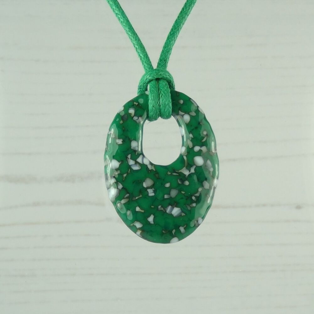 Handcrafted jade green & french vanilla fused glass off-set oval pendant on a waxed cotton cord with lobster clasp (#84)