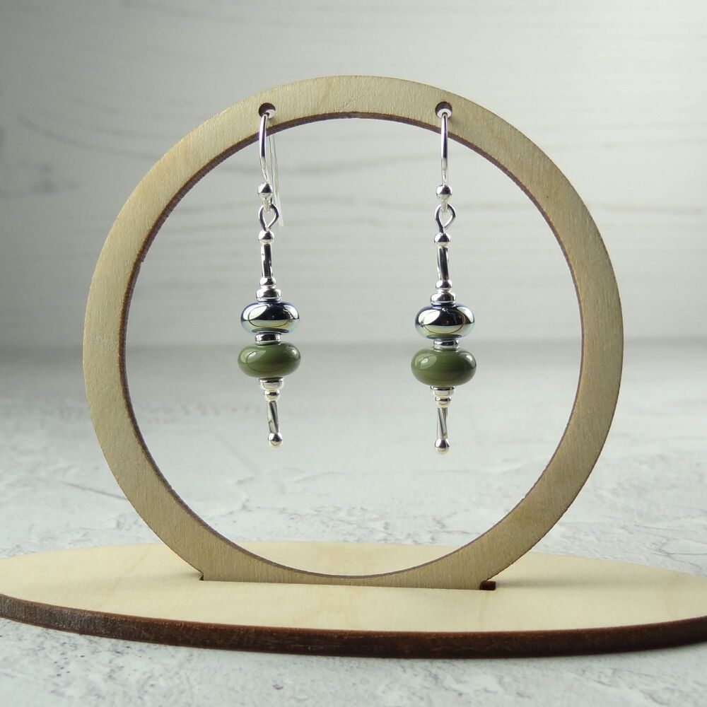 Metallic and olive green handcrafted artisan lampwork glass drop sterling silver earrings on french wires with twists (#217)