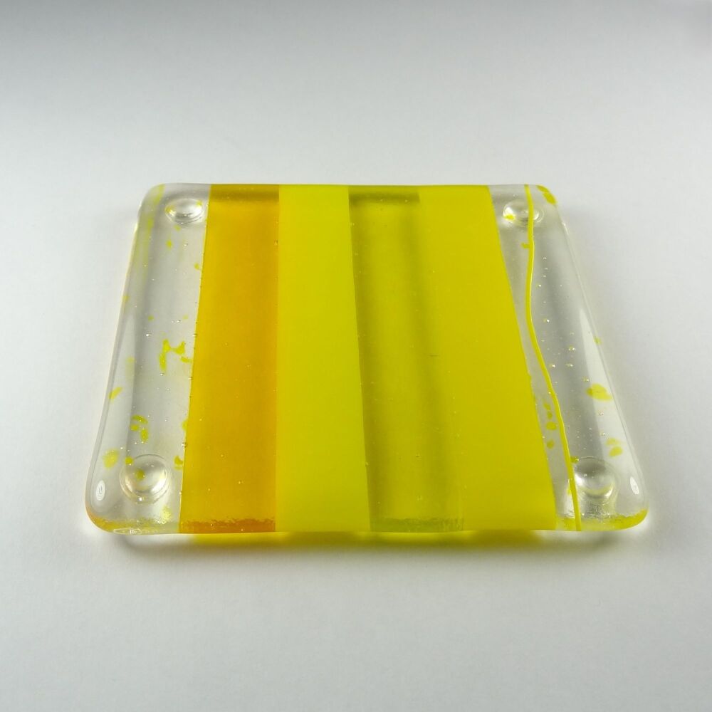 Handcrafted fused glass yellow striped coaster, with bumper feet, 9cm (#25)