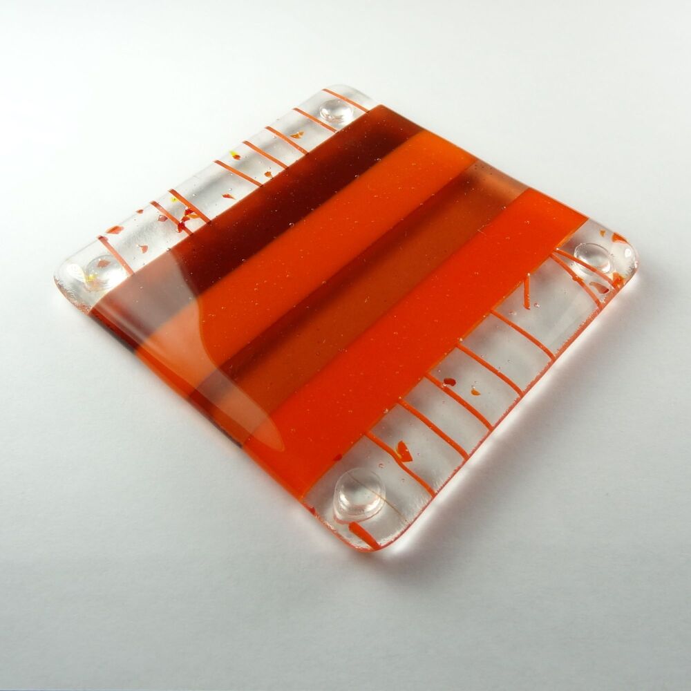 Handcrafted fused glass orange striped coaster, with bumper feet, 9cm (#16)
