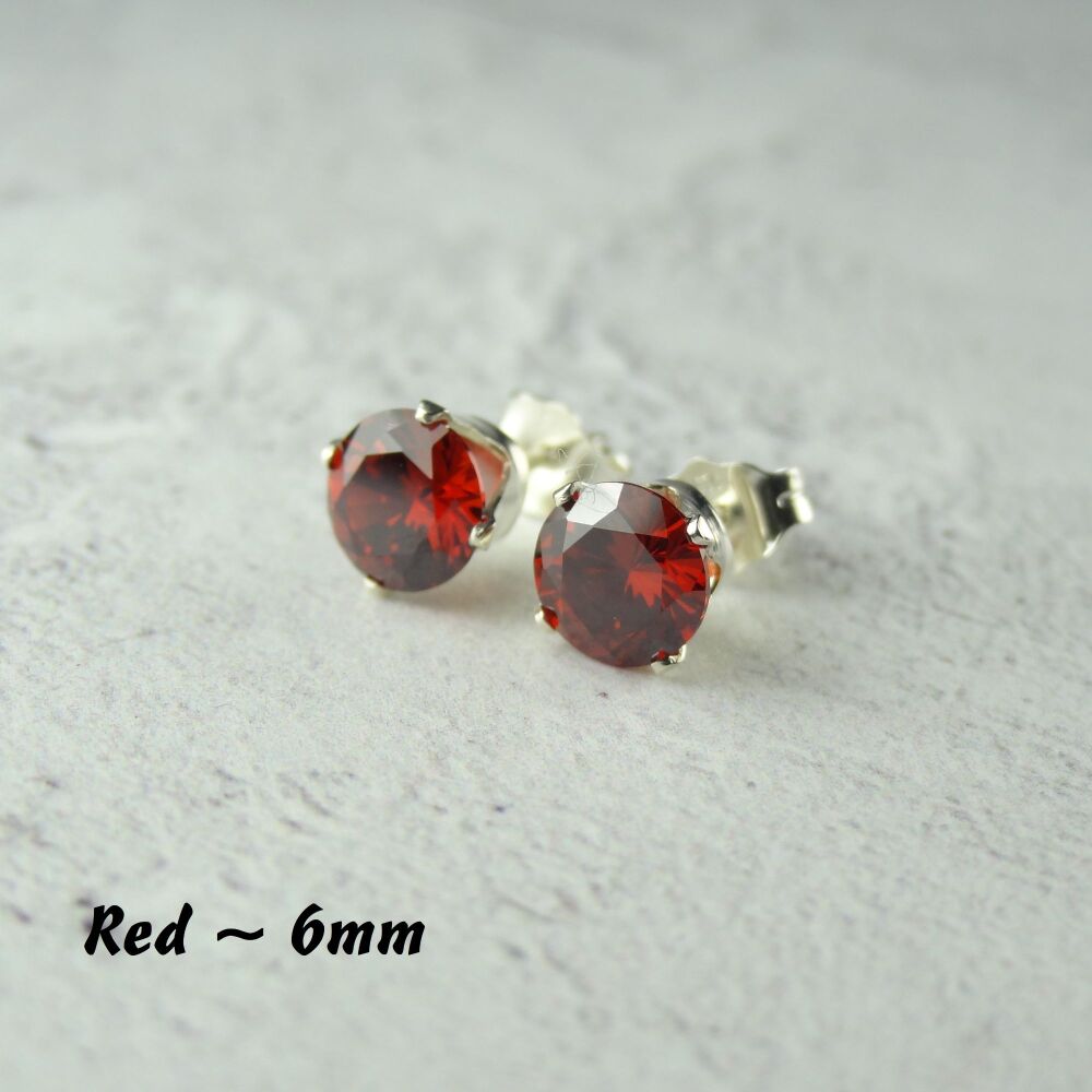 Sterling Silver 6mm faceted red Cubic Zirconia stud earrings in a gift box - Handcrafted with claw setting