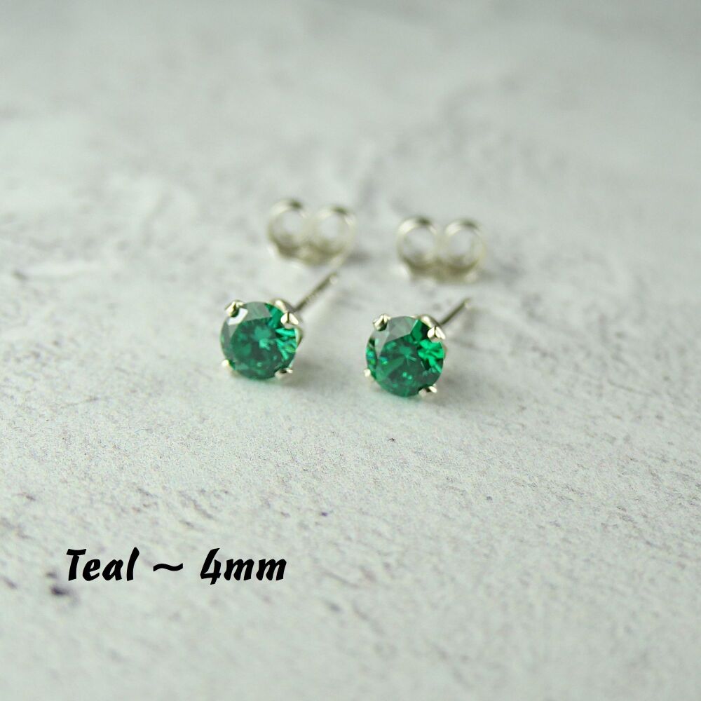 Sterling Silver 4mm faceted teal green Cubic Zirconia stud earrings in a gift box - Handcrafted with claw setting