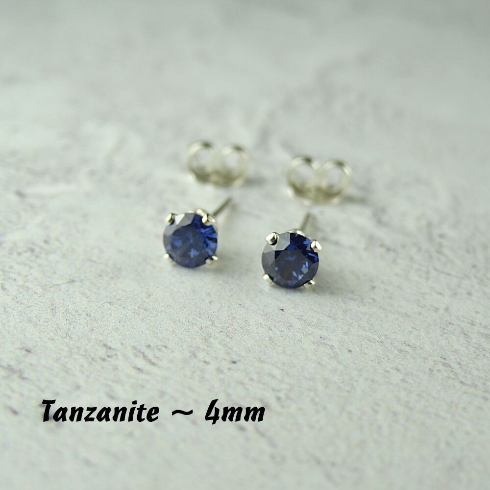 Sterling Silver 4mm faceted tanzanite blue Cubic Zirconia stud earrings in a gift box - Handcrafted with claw setting