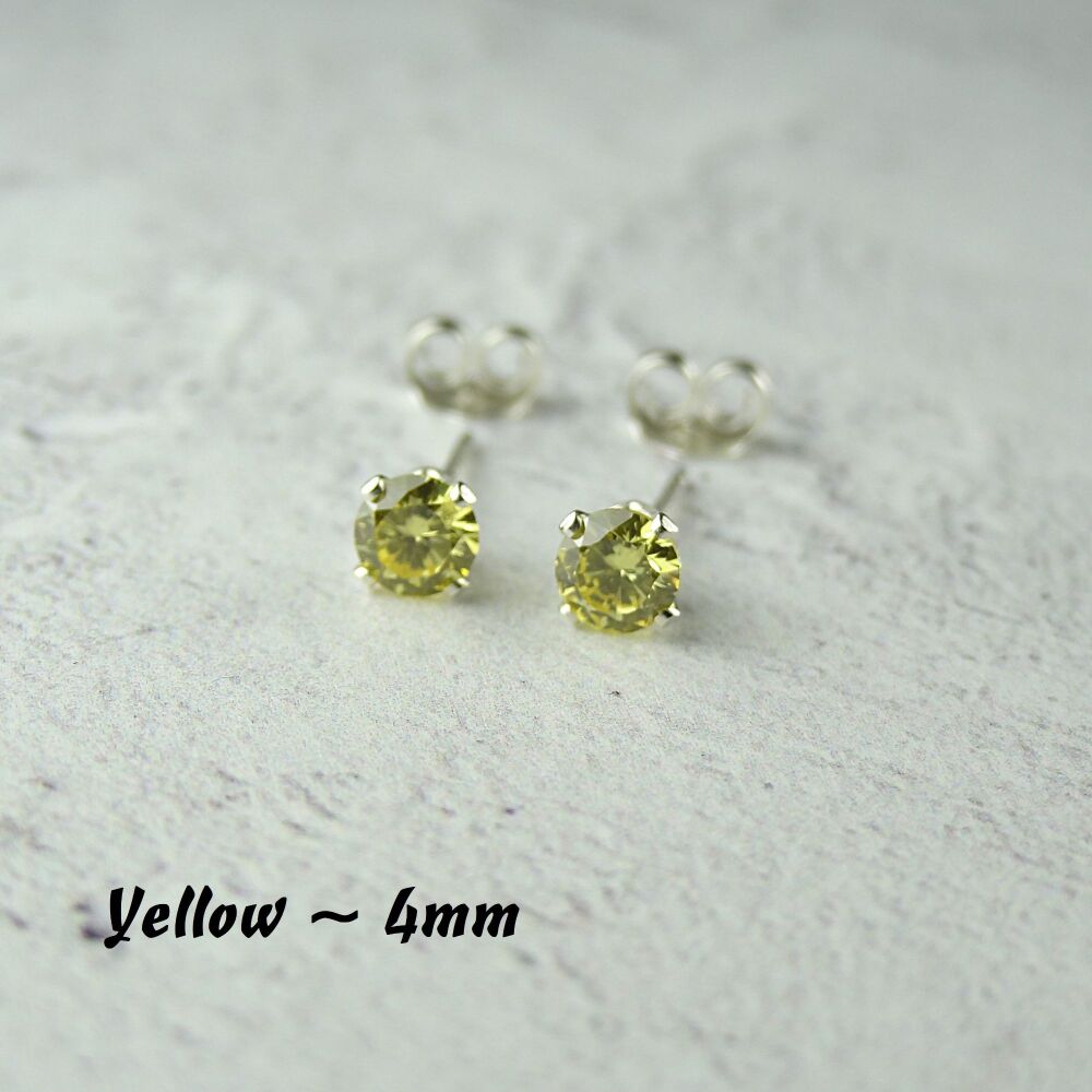 Sterling Silver 4mm faceted yellow Cubic Zirconia stud earrings in a gift box - Handcrafted with claw setting