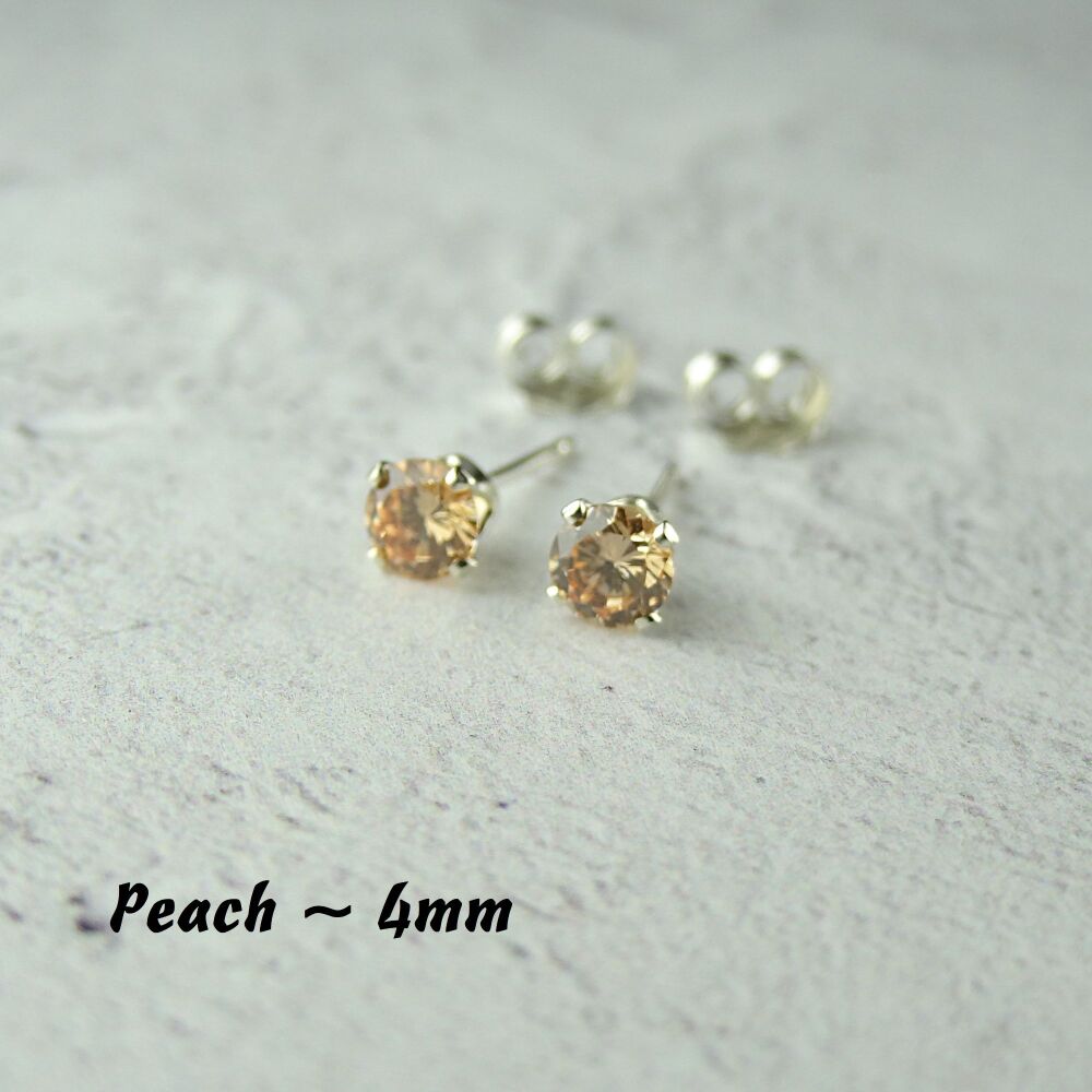 Sterling Silver 4mm faceted peach Cubic Zirconia stud earrings in a gift box - Handcrafted with claw setting