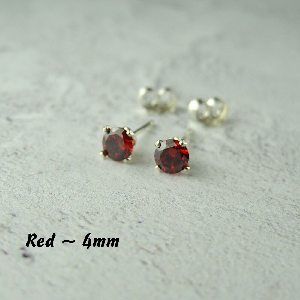 Sterling Silver 4mm faceted red Cubic Zirconia stud earrings in a gift box - Handcrafted with claw setting