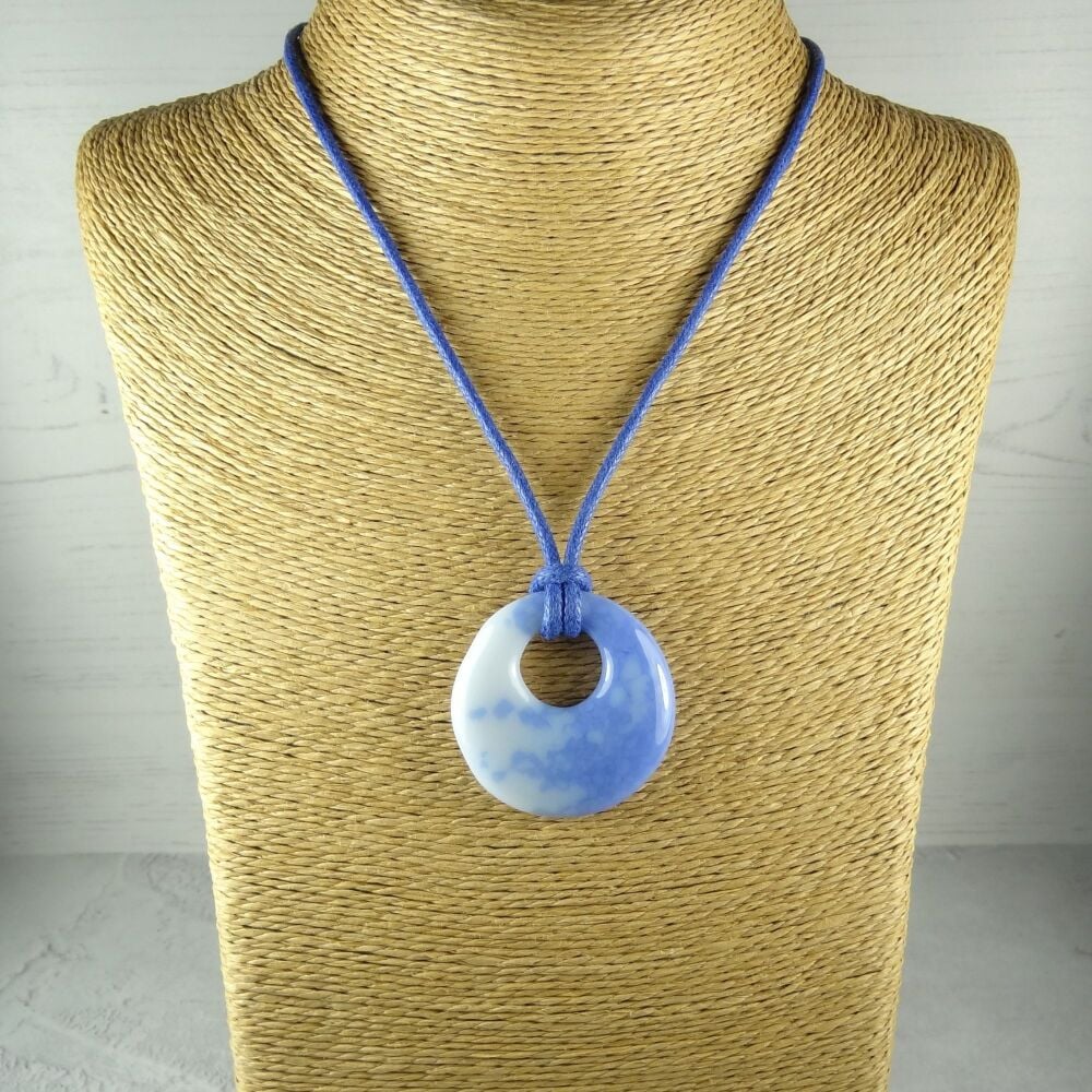 Handcrafted light purple & blue fused glass off-set round pendant on a waxed cotton cord with lobster clasp (#118)