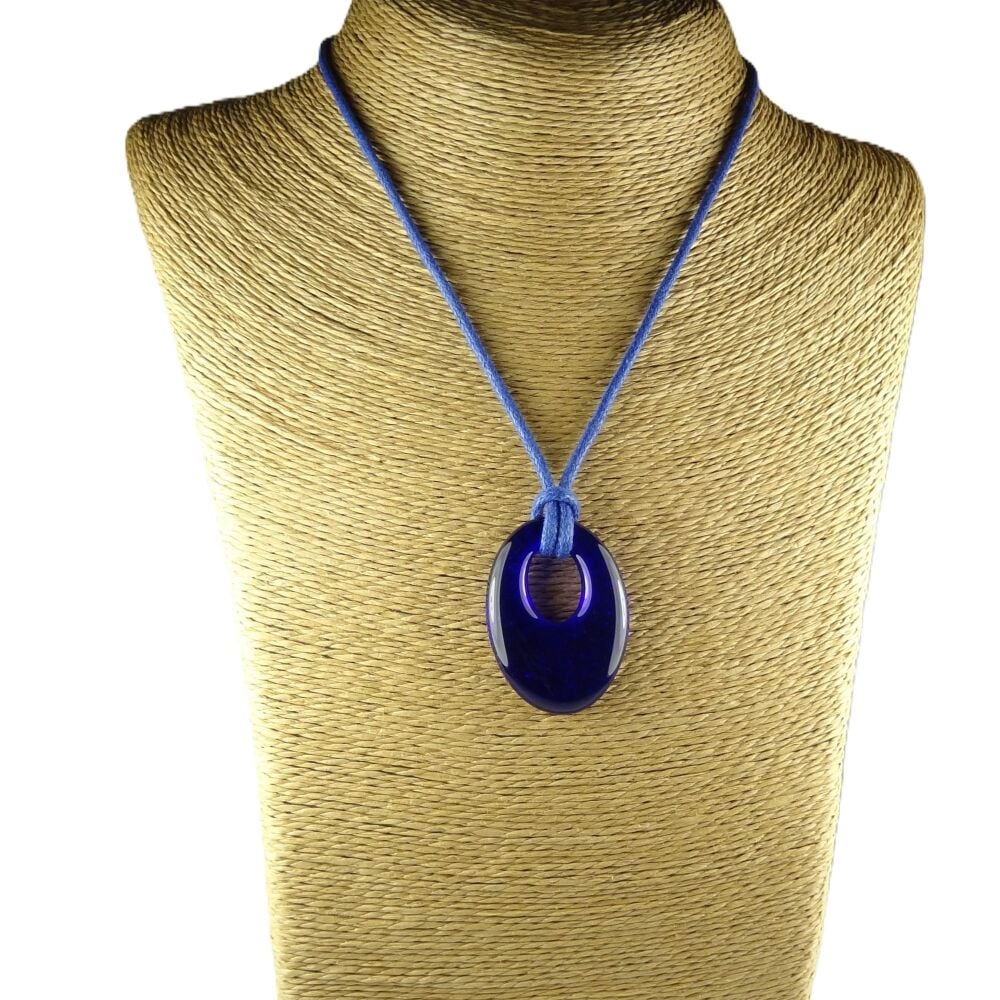 Handcrafted deep royal blue fused glass off-set oval pendant on a waxed cotton cord with lobster clasp (#360)