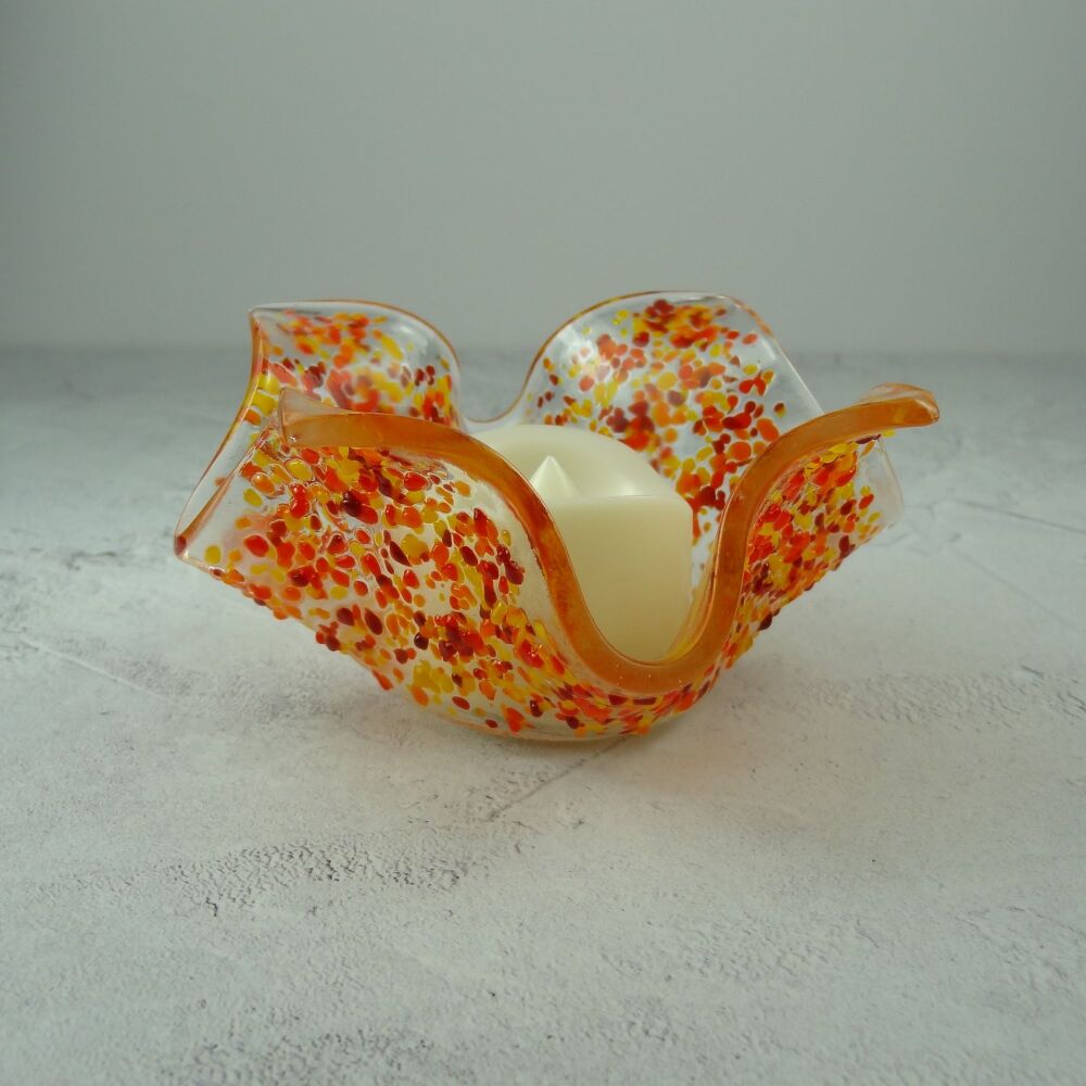 Handcrafted red and orange speckled textured fused glass tealight/candle holder with LED flickering flame battery candle