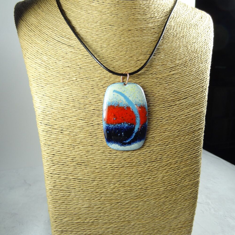 Handcrafted ivory red and blue glass enamelled copper 51x34mm pendant, on an 18 inch black leather cord with lobster clasp (#0079)