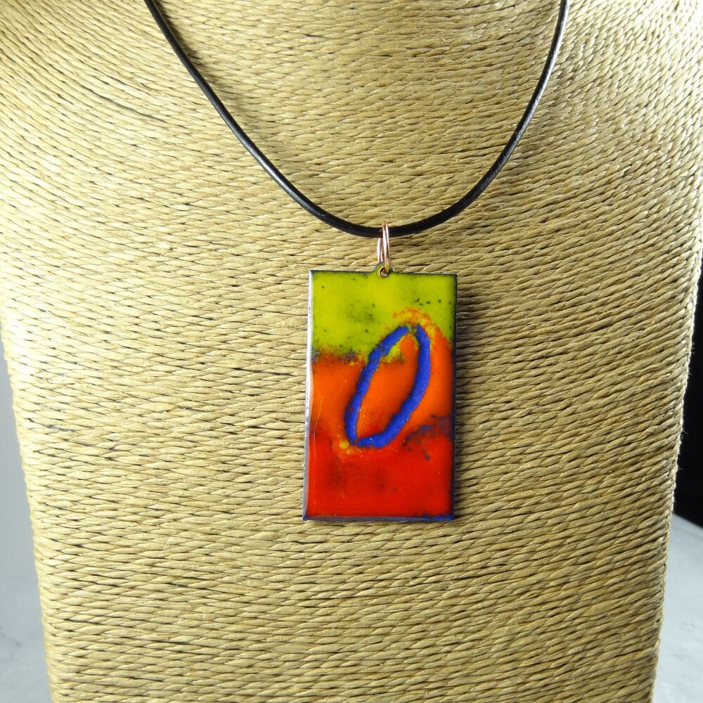 Handcrafted yellow orange red glass enamelled copper 47x29mm pendant, on an 18 inch black leather cord with lobster clasp (#0114)